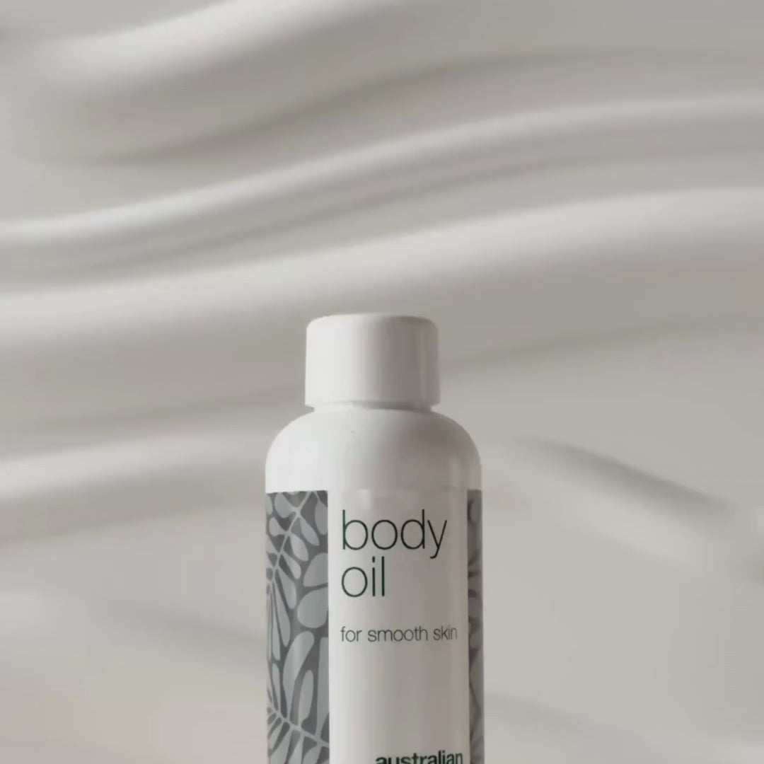Body Oil – Reduziert Dehnungsstreifen, Narben und Pigmentflecken — Body Oil reduziert Dehnungsstreifen, Narben und Pigmentflecken. Mit Mandelöl, Squalan und Vitamin E für eine hydratisierte, geschmeidige Haut.